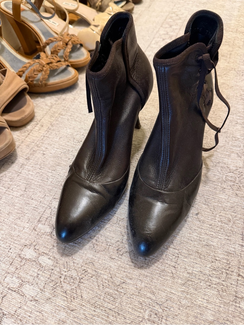 Salvatore Ferragamo elegant dark brown lamb leather rounded toe box lace bootie